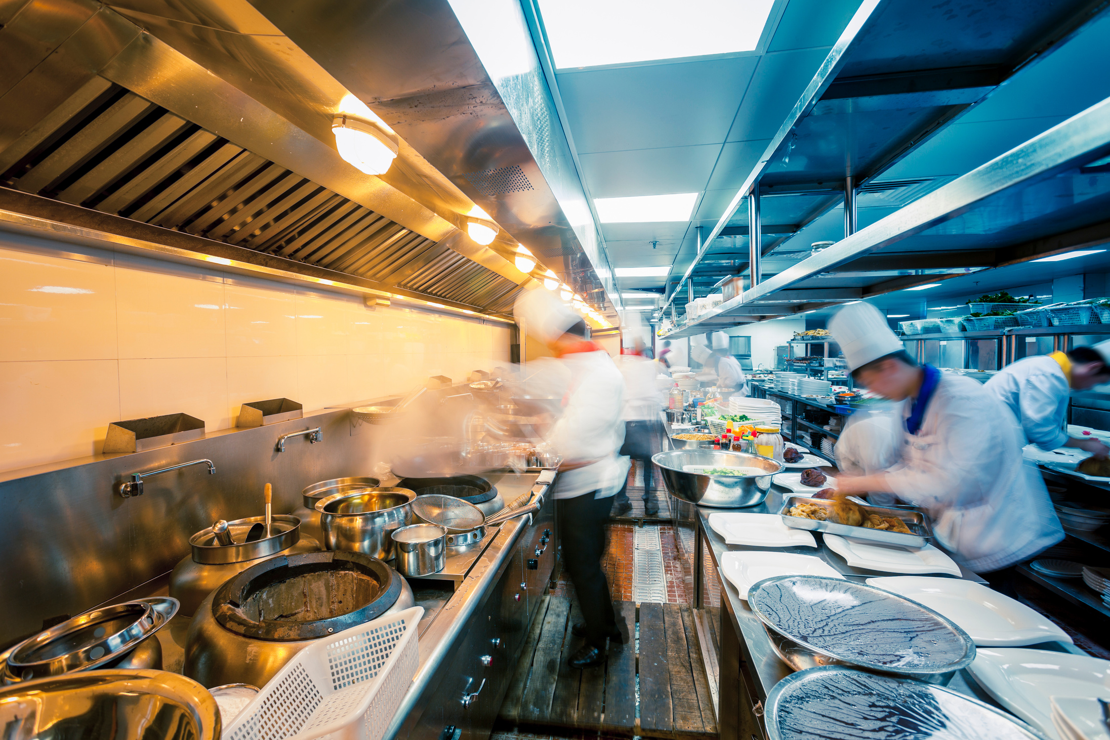 motion chefs of a restaurant kitchen
